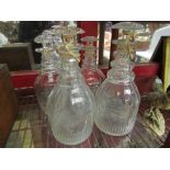 Two pair of crystal glass decanters with melon fluted stoppers