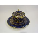 A Bloor Derby gros bleu and gilt inkwell and lid. A similar 19th Century Derby saucer/stand.
