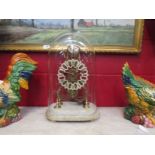 A Skeleton clock with glass dome. Unmarked fusee movement, passing strike on a bell. No pendulum.