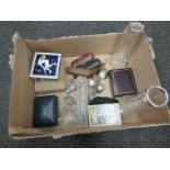 A box containing assorted including cheroot holders, silver spoons and medals,