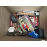 A box containing assorted including tins of badges, lighter, leather cigar holder, card case,