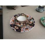 A Derby porcelain Imari palette tea cup and saucer.
