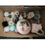 A box containing miscellaneous ceramics including a novelty teapot, studio pottery etc.