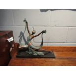 A resin figure of Art Deco style dancer on stand,