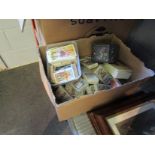 A box containing a quantity of mostly cigarette cards