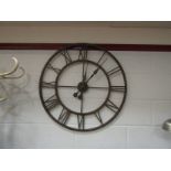 A retro style metalwork oversized wall clock