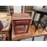 A fruitwood lamp table with single drawer and undertier,