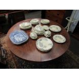 A quantity of Hanley Trellis design 19th Century dinner wares together with graduating blue and