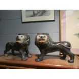 Two ceramic lions,