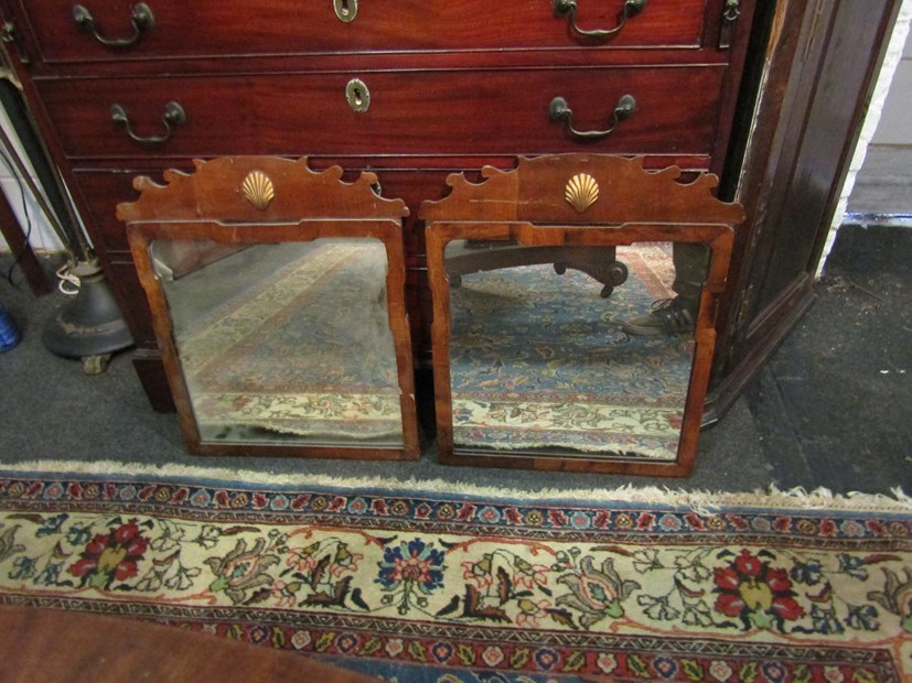 A pair of Regency mahogany fretwork wall mirrors