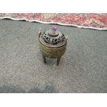 A Chinese bronze censer and hardwood cover with amethyst finial