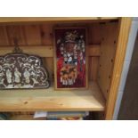 A framed Indian chief tile wall hanging,