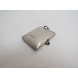 A Victorian silver double photograph locket of plain rectangular form,