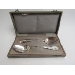 A pair of Dutch serving spoons by Van Kempen & Zoon, The Hague 1921, 28cm long,