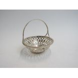 A George V silver small bonbon basket of circular form,