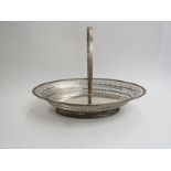 A Thomas Hemming silver fruit basket, pierced body engraved with swing handle, London 1781,