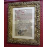 A gilt framed Oriental print of a peacock,