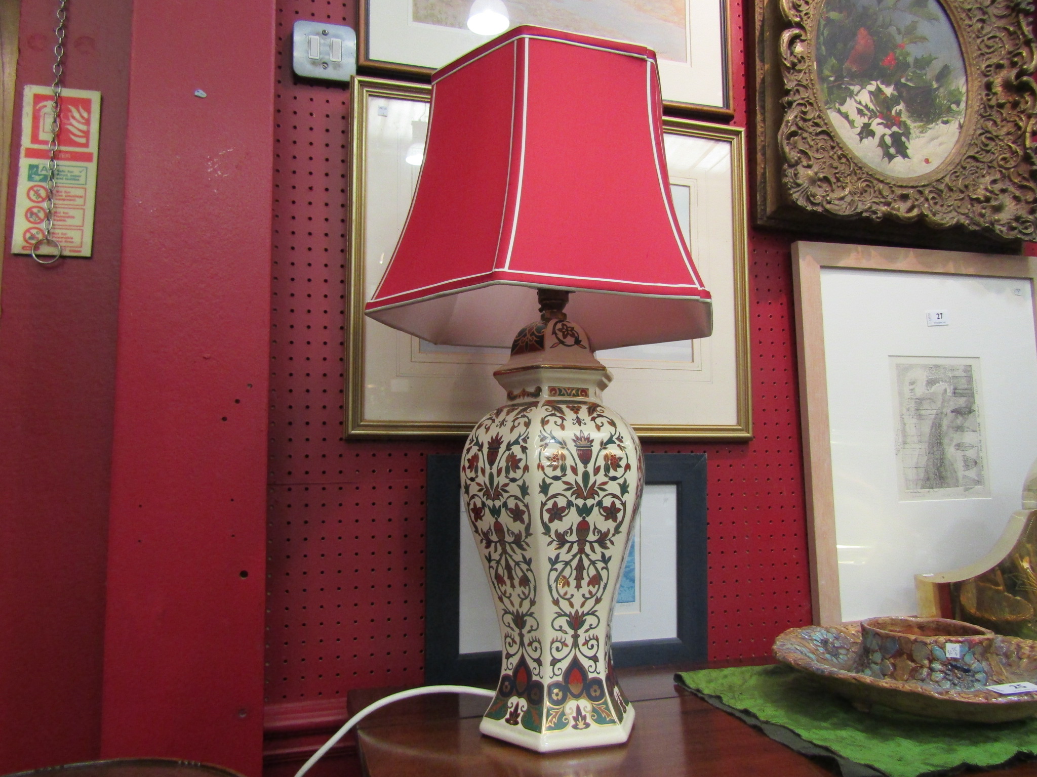 A table lamp decorated in green,
