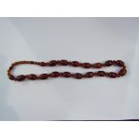 An amber type bead necklace