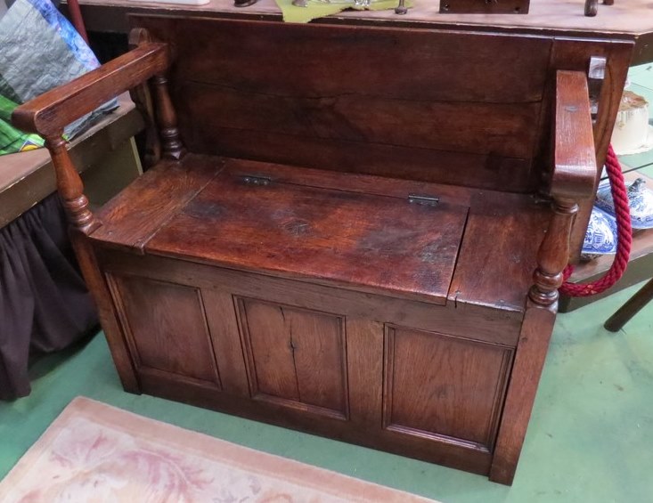 An 18th Century revival oak Monks bench the drop down table top over a hinged seat box seat settle - Image 2 of 3