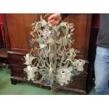 A highly ornate electrolier with ivy foliate design,