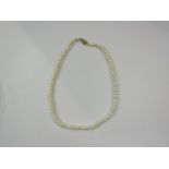 A single strand of irregular shaped pearls,