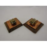A pair of WW1 trench art miniature brass and copper tanks on oak bases