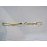 A single strand of 5mm pearls, 50cm long, gold stone set clasp,