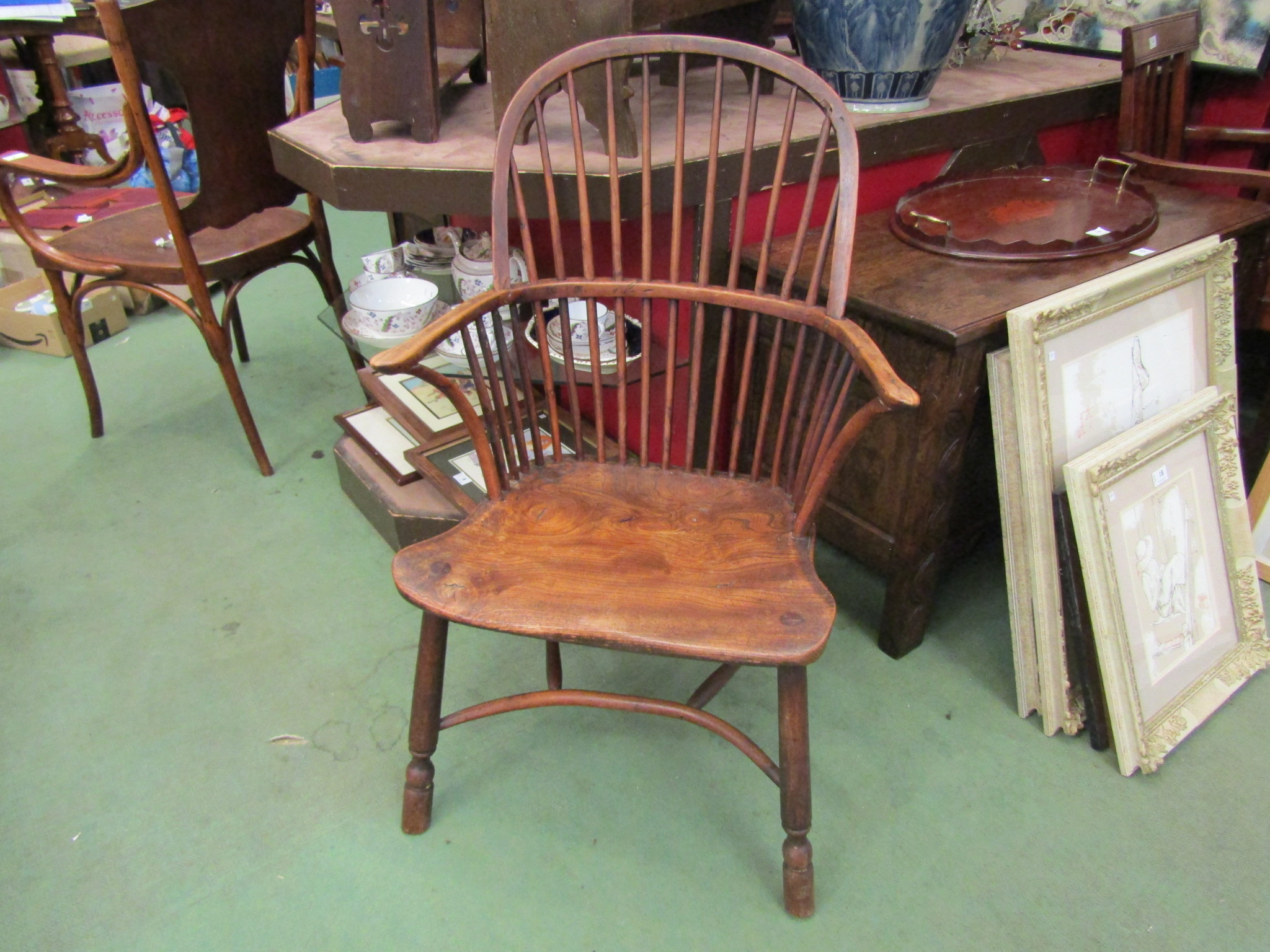 A 19th Century Windsor chair with elm seat,