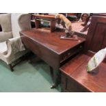 A Regency mahogany drop flap table, 101cm open, 100cm deep,