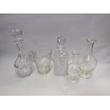 A selection of cut glass decanters, carafes,