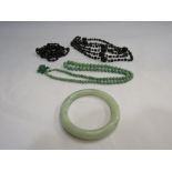 A jade bangle,