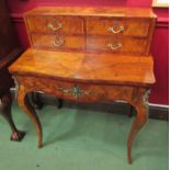 A burr walnut French style ladies writing desk with tulip wood inlay, brush slide and single drawer,