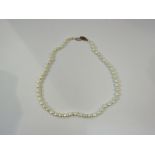 A single strand of irregular shaped pearls,