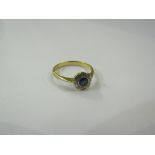 A gold sapphire and diamond flower ring, stamped 18ct. Size M, 2.