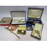 A quantity of bijouterie including Mother-of-pearl cross pendant, brooches, necklaces,