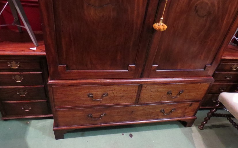 An early Victorian mahogany full hanging wardrobe the two doors over faux base drawers on bracket - Image 3 of 4