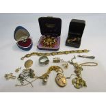 A costume brooch, dress ring, Persian silver buckle ring etc.