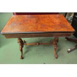 Stamped "Maple & Co" a burr walnut circa 1860 card table on turned and carved base with ceramic