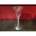 A Georgian wine glass with trumpet bowl and multi-spiral stem,