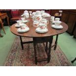 An 18th Century oak gateleg table the single end drawer over bobbin turned leg supports joined by