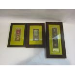 Three framed medal and badge displays including RAOB