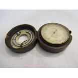 An Elliott Bros pocket barometer and thermometer,