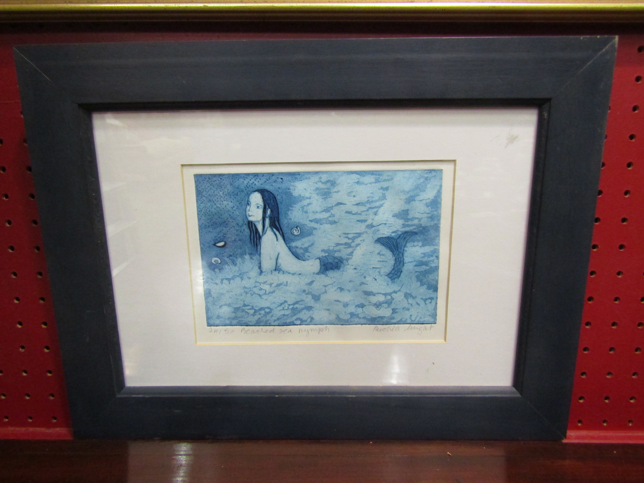 A limited edition print "Beached Sea Nymph", signed and numbered, framed and glazed,
