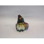 A Royal Doulton figure "Silks and Ribbons", modern, hairline crack to base,