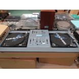 A DJ console comprising pair of Citronic CL 300D turntables and Citronic Teknodek mixer