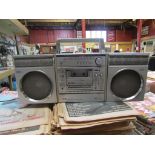 A Sanyo boom box with detachable speakers