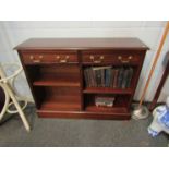 A Sydney Smith reproduction mahogany bookcase with two drawers,