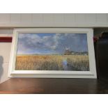 KEN CURTIS: A framed acrylic on board of Cley windmill, signed lower right, 37cm x 68.