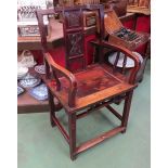 An elm Chinese armchair with carved panel central splat,